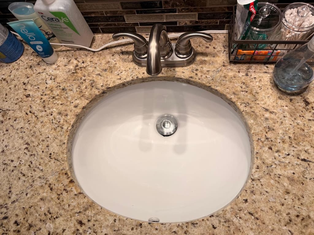Bathroom sink after cleaning by Eli Cleaning Services