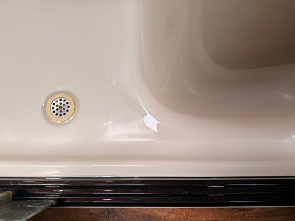 Tub and shower track after deep cleaning